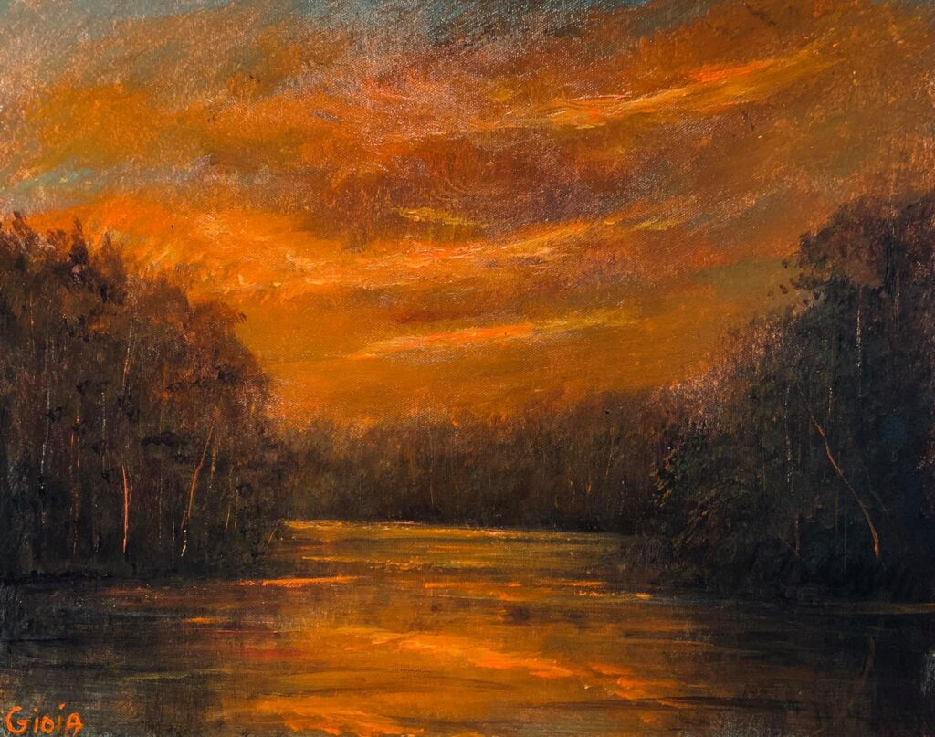A painting of an orange sky and trees